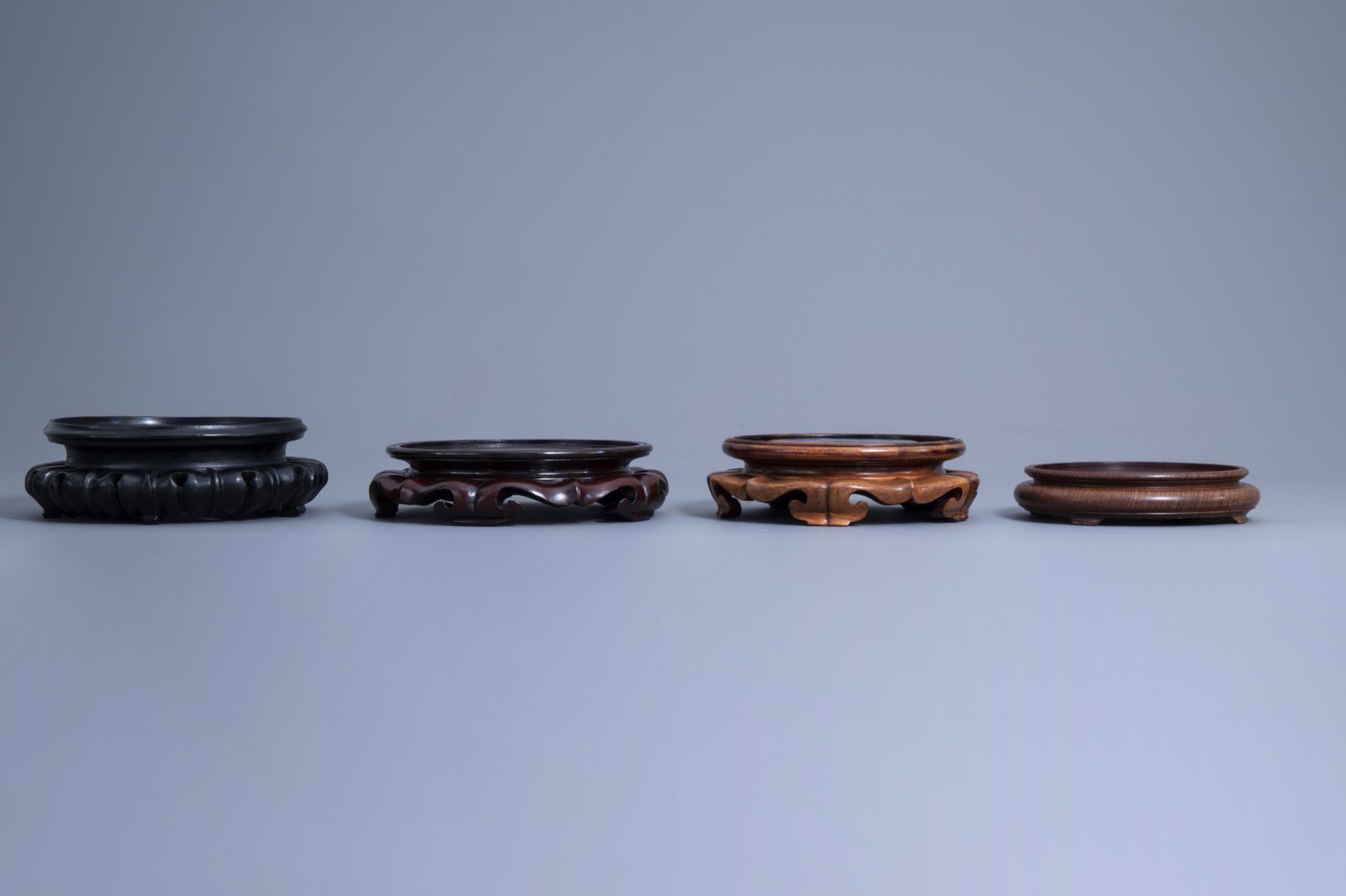 A collection of Chinese carved wooden stands, 19th/20th C. - Image 4 of 19