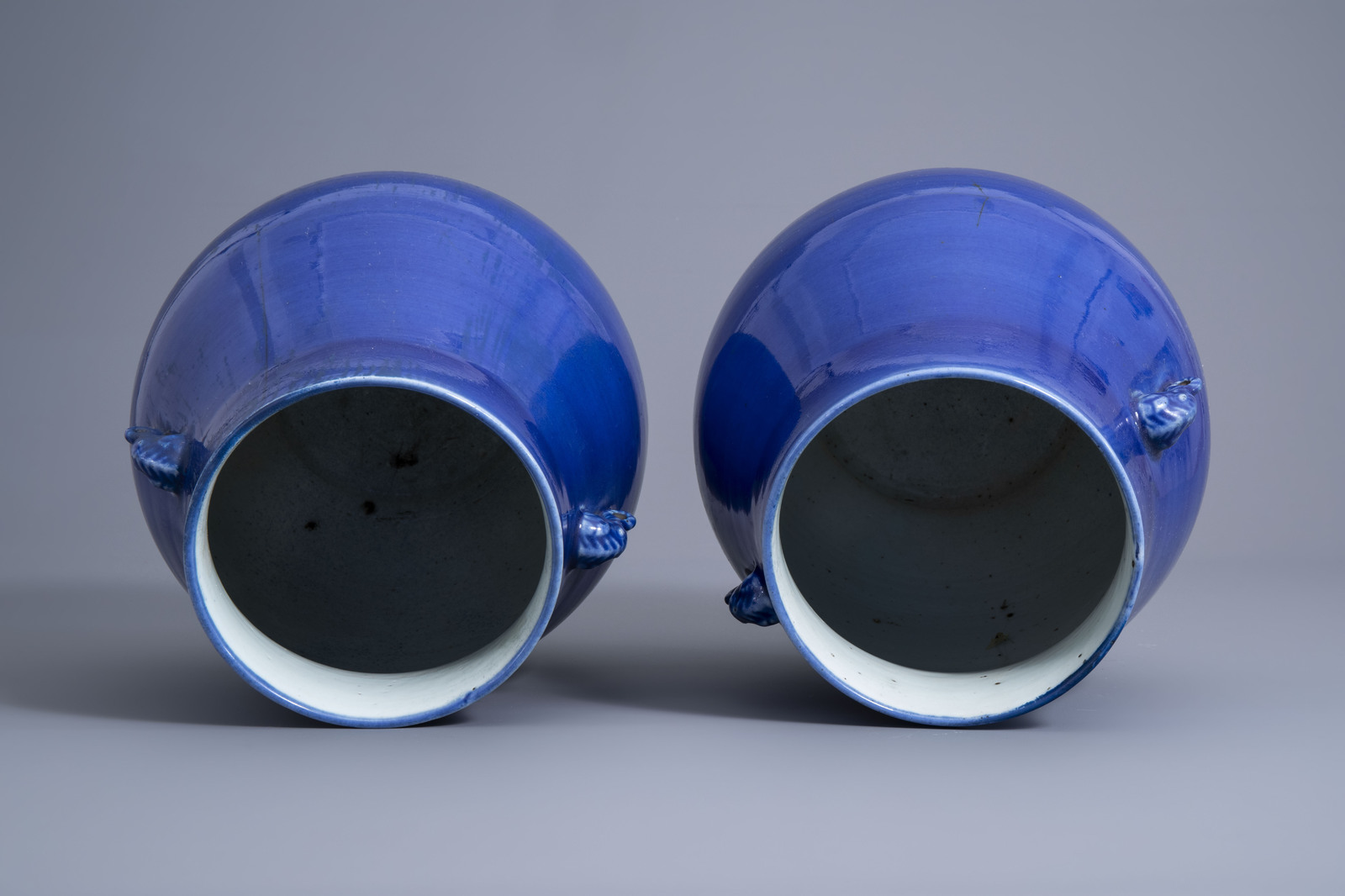 A pair of Chinese monochrome blue 'hu' vases, 19th C. - Image 6 of 8