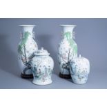 A pair of Chinese qianjiang cai vases with birds on blossoming branches and a vase and cover and gin