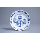 A Chinese blue and white saucer dish with amorous shepherds, Chenghua merk, Kangxi