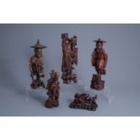 Five various Chinese carved wooden figures, 19th/20th C.