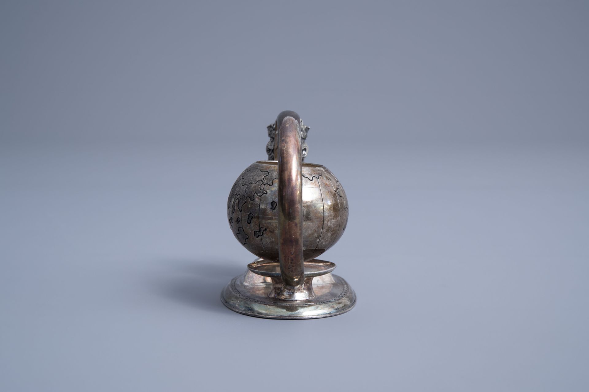 A Vietnamese silver tea strainer in the shape of a mythical animal playing with a globe, 800/000, 19 - Image 6 of 11