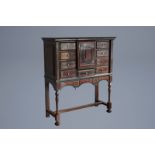 A large tortoise veneer and ebony wood cabinet on stand, Antwerp, 17th C. and later