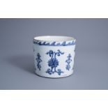 A large Chinese blue and white brush pot with calligraphy and flowers, 19th/20th C.