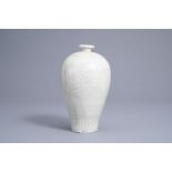 A Chinese monochrome Cizhou vase with incised floral design, Song