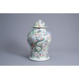 A Chinese famille rose '100 boys' vase and cover, 19th C.