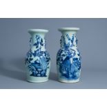 Two Chinese blue and white celadon vases with peacocks on a rock, 19th C.