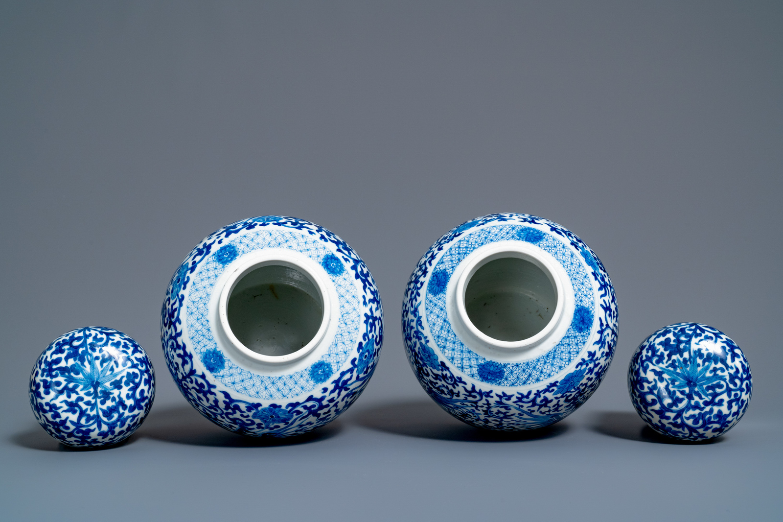 A pair of Chinese blue and white 'phoenix' jars and covers with floral design, Kangxi mark, 19th C. - Image 6 of 7