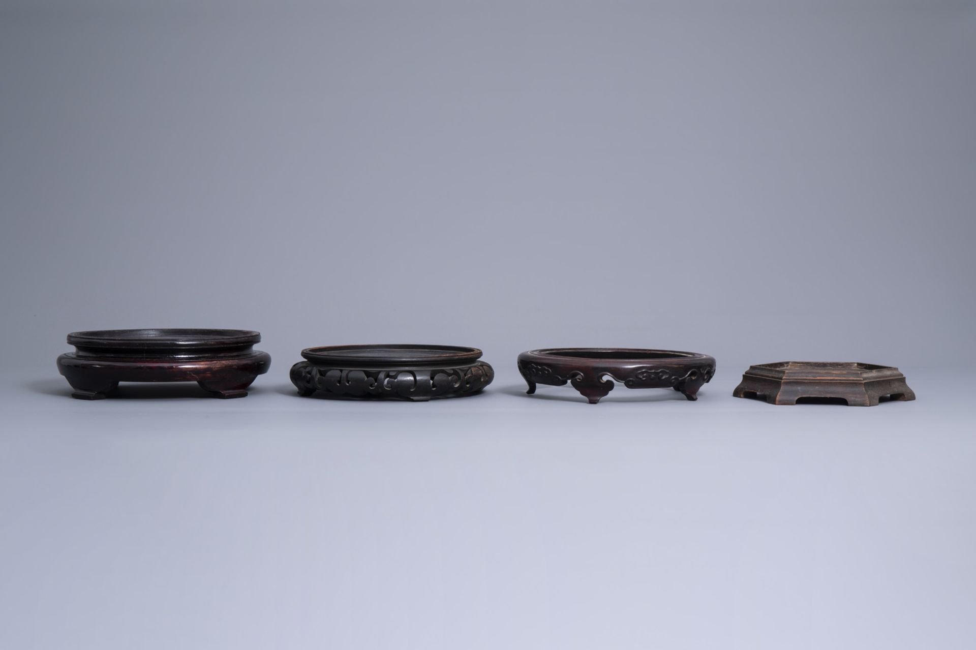 A collection of Chinese wooden stands, 19th/20th C. - Image 10 of 23
