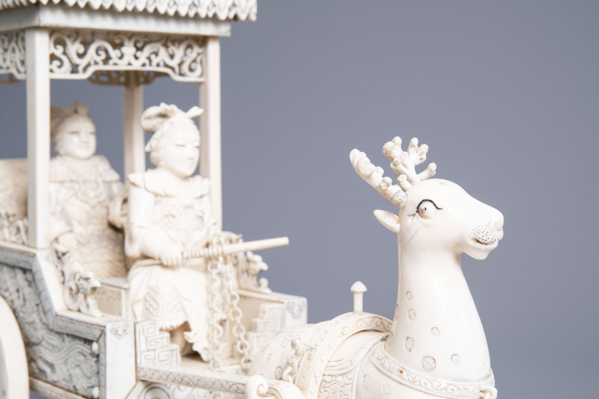 A large Chinese carved ivory 'deer carriage' group, 19th/20th C. - Image 7 of 9