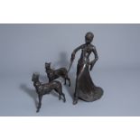 In the manner of Demetre Chiparus (1886-1947): Lady with two dogs, patinated bronze