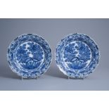 A pair of Dutch Delft blue and white accolade shaped dishes with floral design, 18th C.