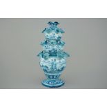 An Italian blue and white pyramidal tulip vase with animated landscapes, Cantagalli, 19th C.