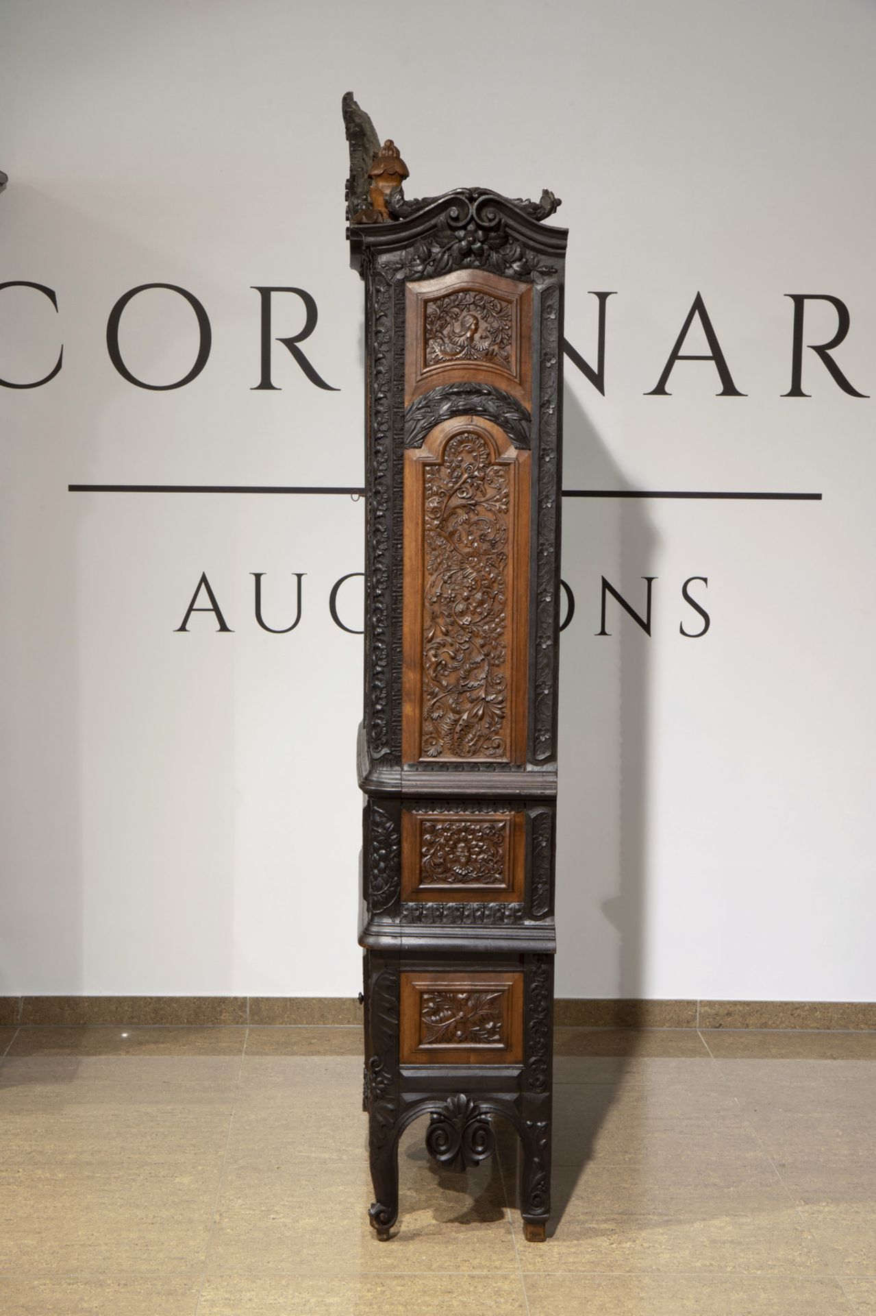A colonial inspired and orientalist carved and ebonised wooden cabinet, first half of the 20th C. - Image 6 of 8