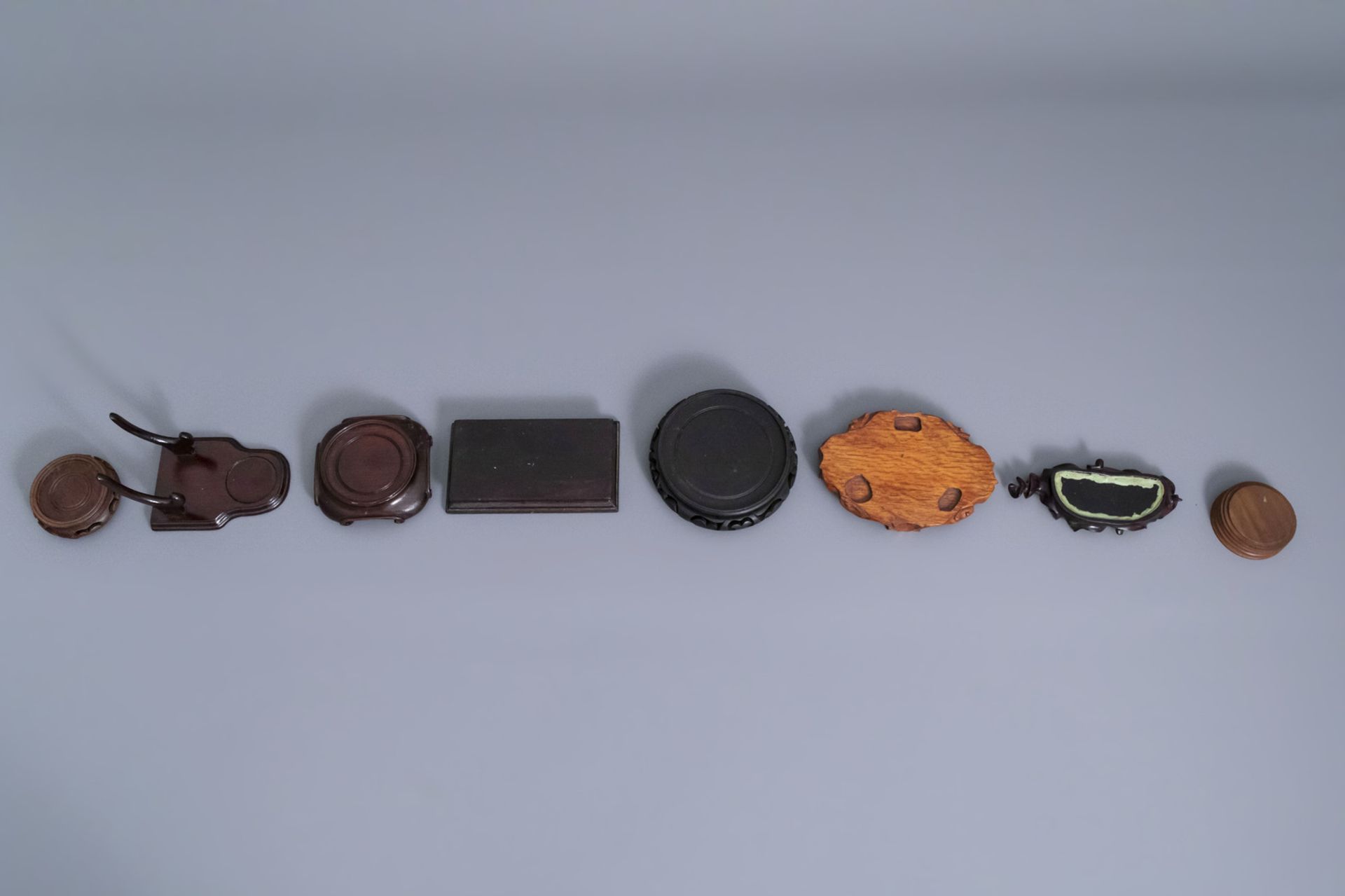 A collection of Chinese wooden stands, 19th/20th C. - Image 18 of 23