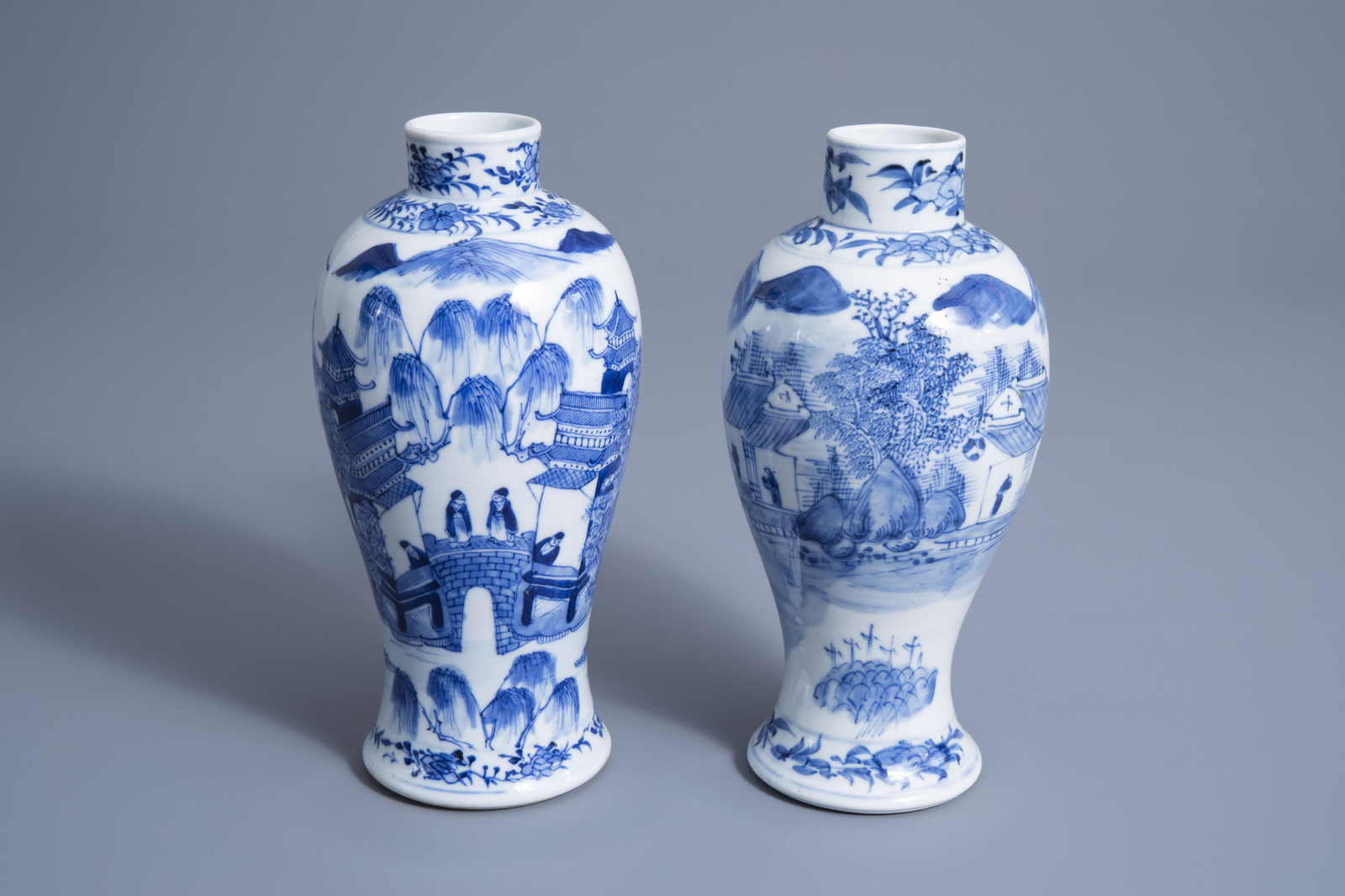 Two Chinese blue and white baluster vases with figures in a river landscape, Kangxi mark, 19th C. - Image 7 of 7