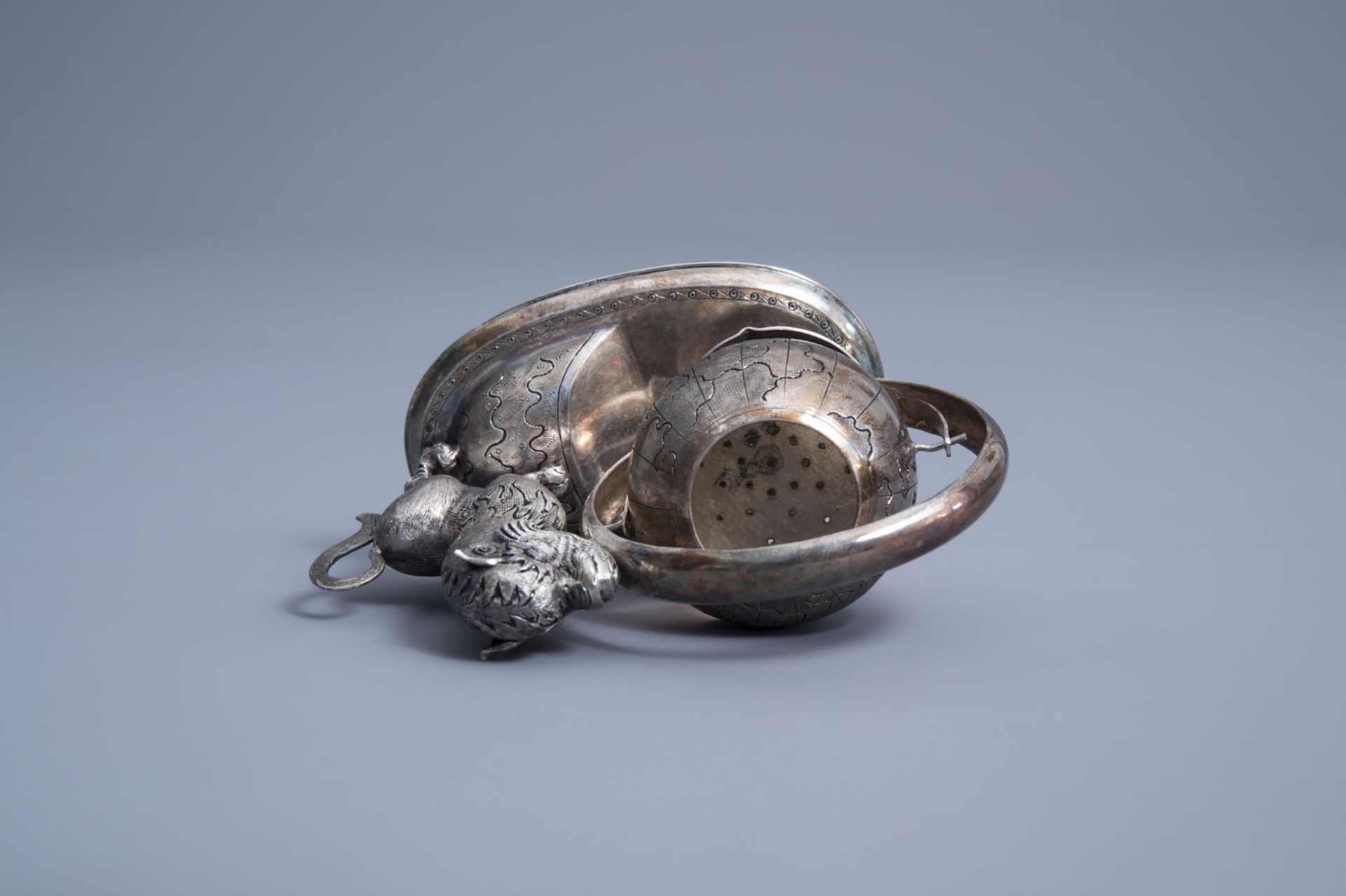 A Vietnamese silver tea strainer in the shape of a mythical animal playing with a globe, 800/000, 19 - Image 7 of 11