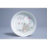 A Chinese famille rose saucer dish with floral design, Yongzheng mark, 19th/20th C.