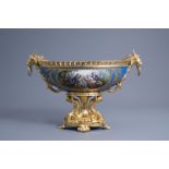 A large French Svres style porcelain gilt bronze mounted oval bowl with floral design and gallant s