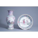A Chinese famille rose vase and a charger with ladies in a garden, 20th C.