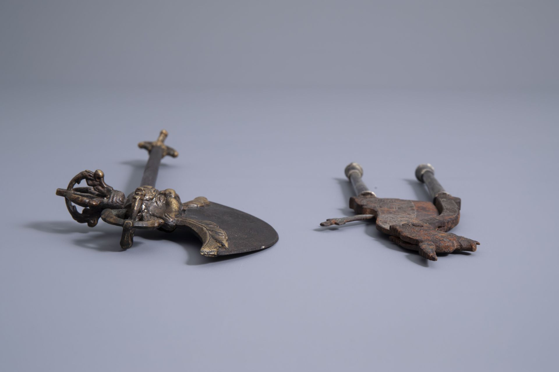 Three Tibetan miniature weapons, an Indonesian betel nut cracker and a kris, 19th/20th C. - Image 7 of 11