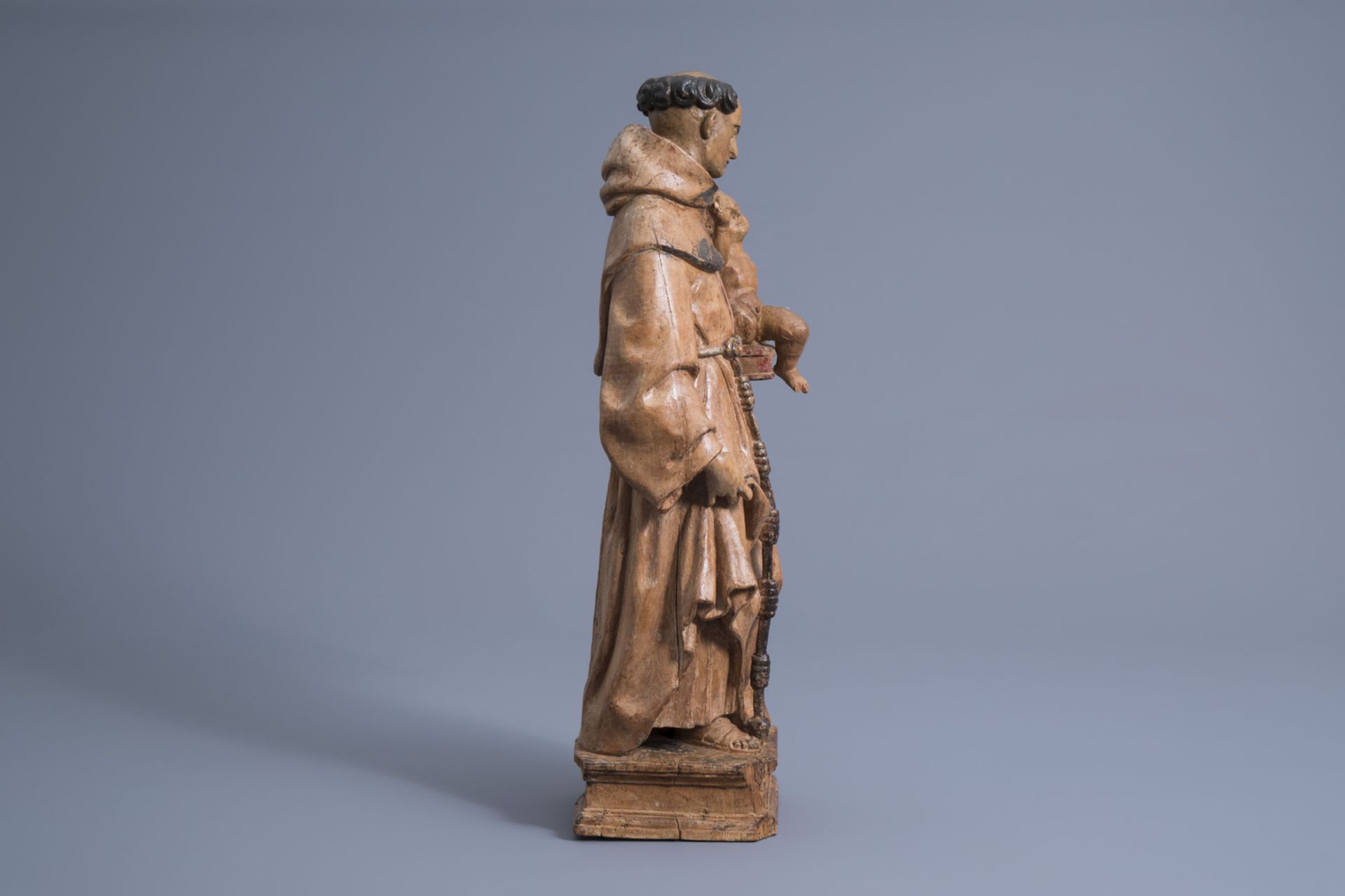 A carved wooden figure of Saint Anthony of Padua with Child, the Netherlands, 16th C. - Image 3 of 7