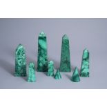 An extensive and decorative set of six obelisks and two cones in malachite, 20th C.