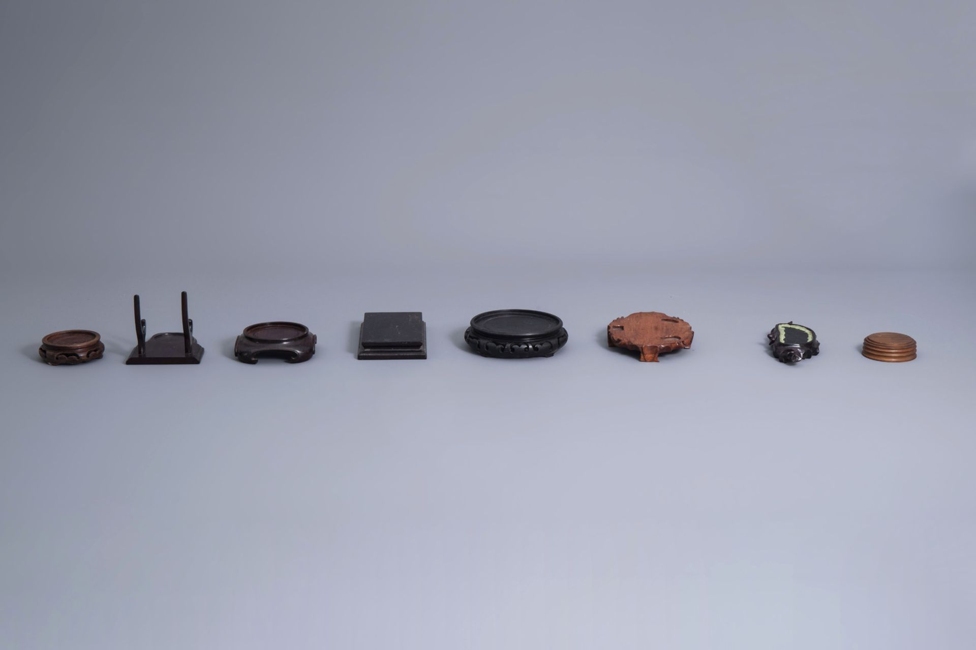 A collection of Chinese wooden stands, 19th/20th C. - Image 15 of 23