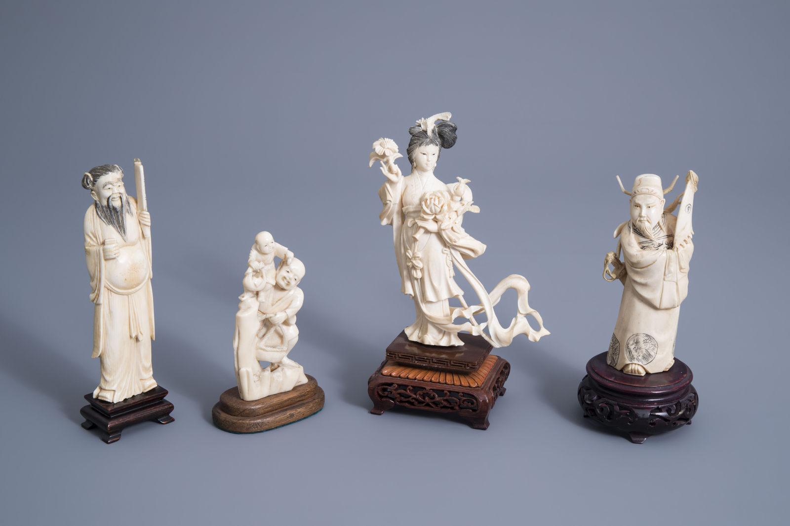 Four Chinese carved ivory figures, 19th/20th C.