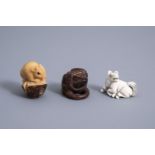 Three netsuke in wood, ivory and bone, Japan, Meiji/Showa, 19th/20th C.