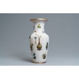 A Chinese cloisonnŽ vase with applied design of antiquities, 19th C.