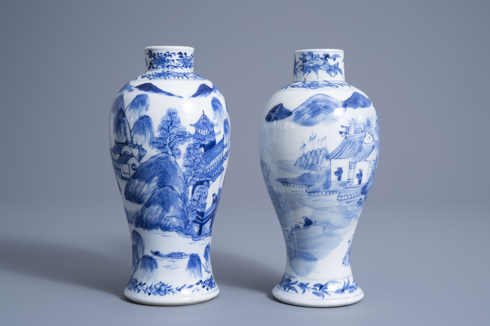 Two Chinese blue and white baluster vases with figures in a river landscape, Kangxi mark, 19th C. - Image 2 of 7