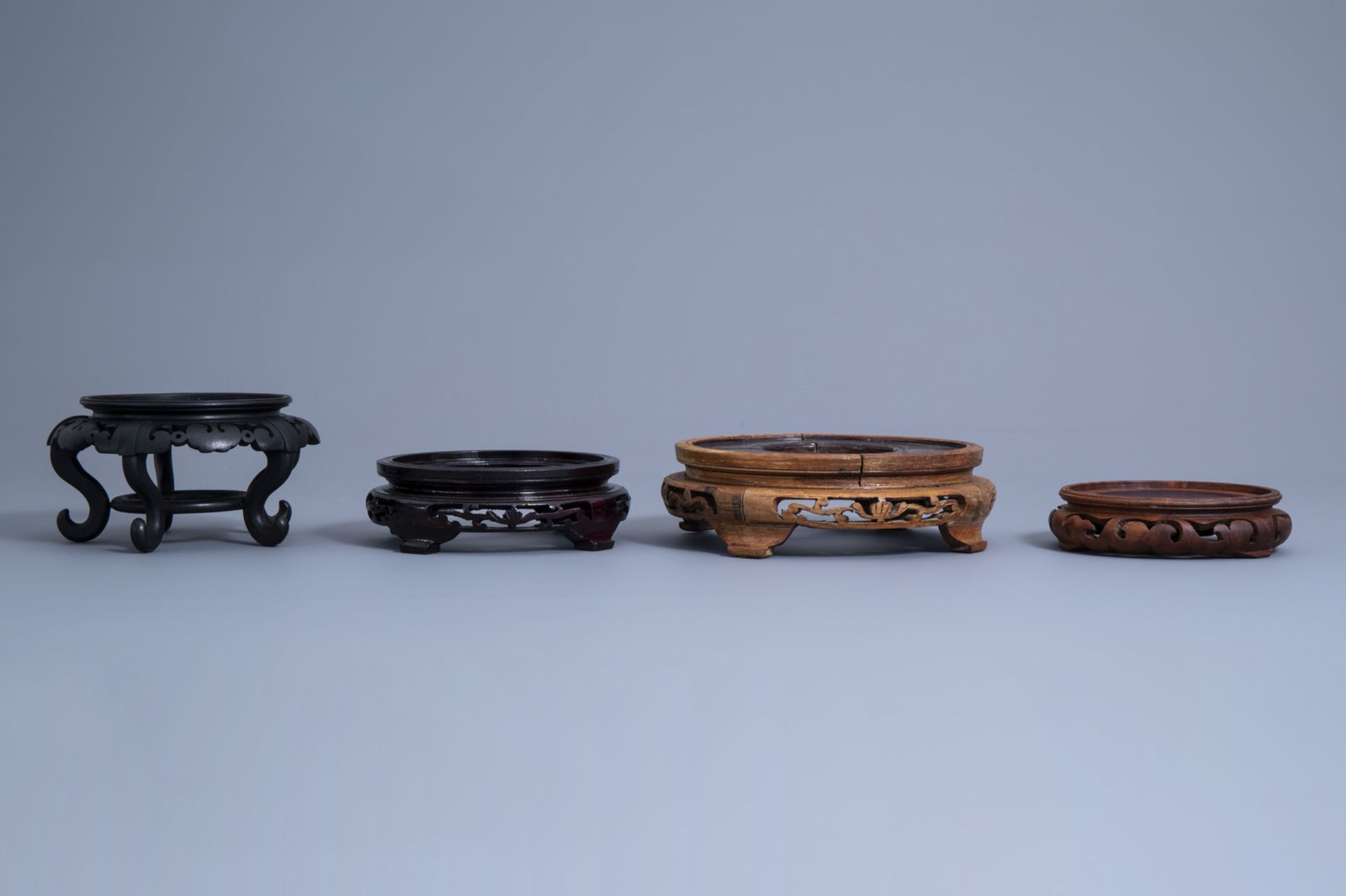 A collection of Chinese carved wooden stands, 19th/20th C. - Image 9 of 19