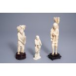 Two Chinese ivory figures and a Japanese okimono, 19th/20th C.