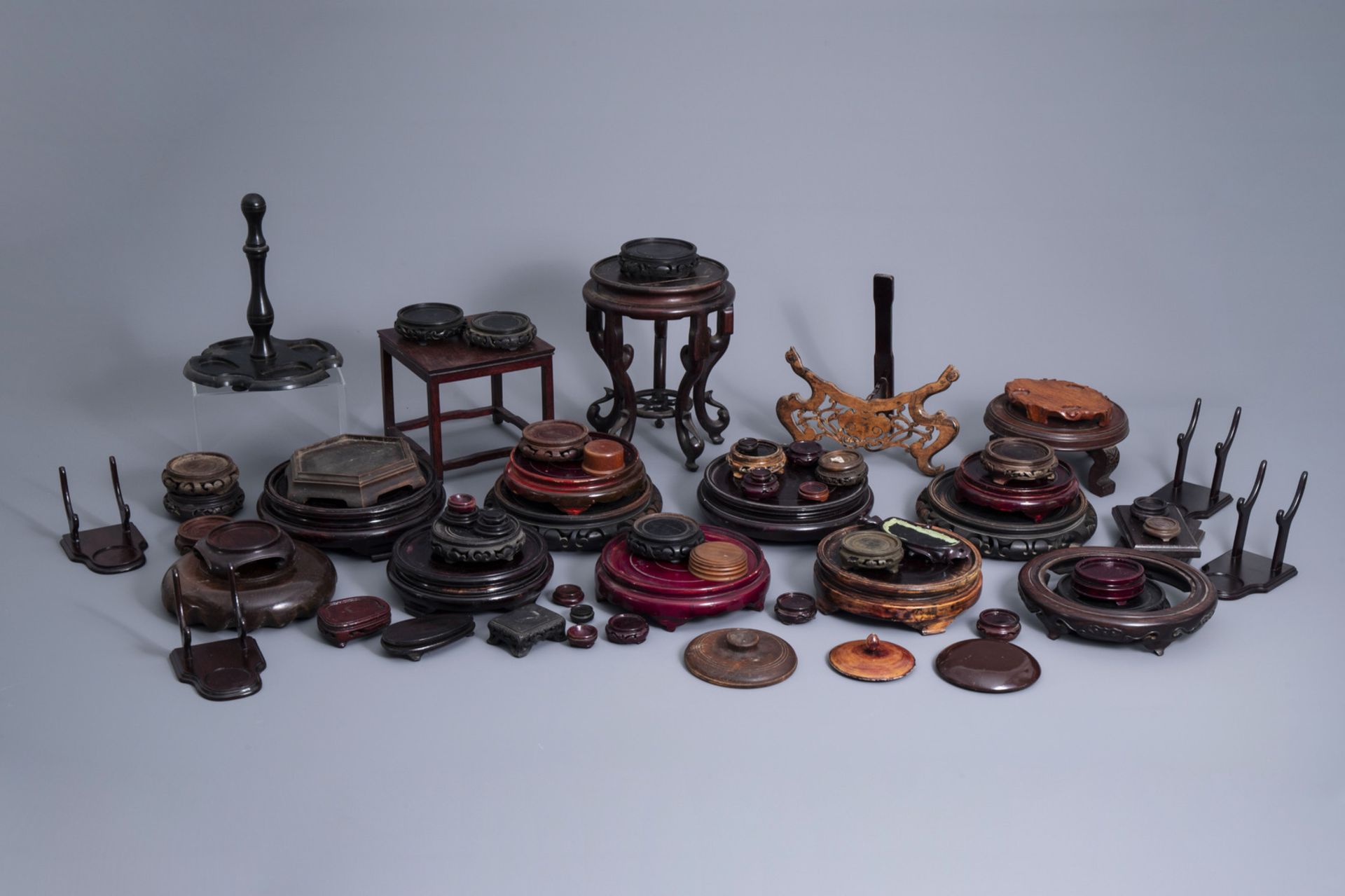 A collection of Chinese wooden stands, 19th/20th C.