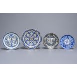 Four blue, white and polychrome Qajar pottery dishes, Iran, 19th C.