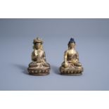 Two Sino-Tibetan gilt bronze figures of a seated Buddha, 19th/20th C.