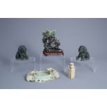 A Chinese brush washer, a seal, a pair of lions and a group with three qilins in jade and hardstone,