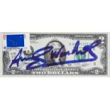 Andy Warhol (1928-1987): An autographed two-dollar bill depicting Thomas Jefferson, dated 1976