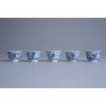 Five Chinese blue and white 'fish' cups, Kangxi