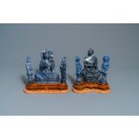 Two Chinese lapis lazuli groups on a wood stand and with a marble base, 20th C.