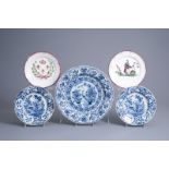 Two Dutch Delft blue and white plates and a charger and two French faience de l'Est plates, 18th/19t