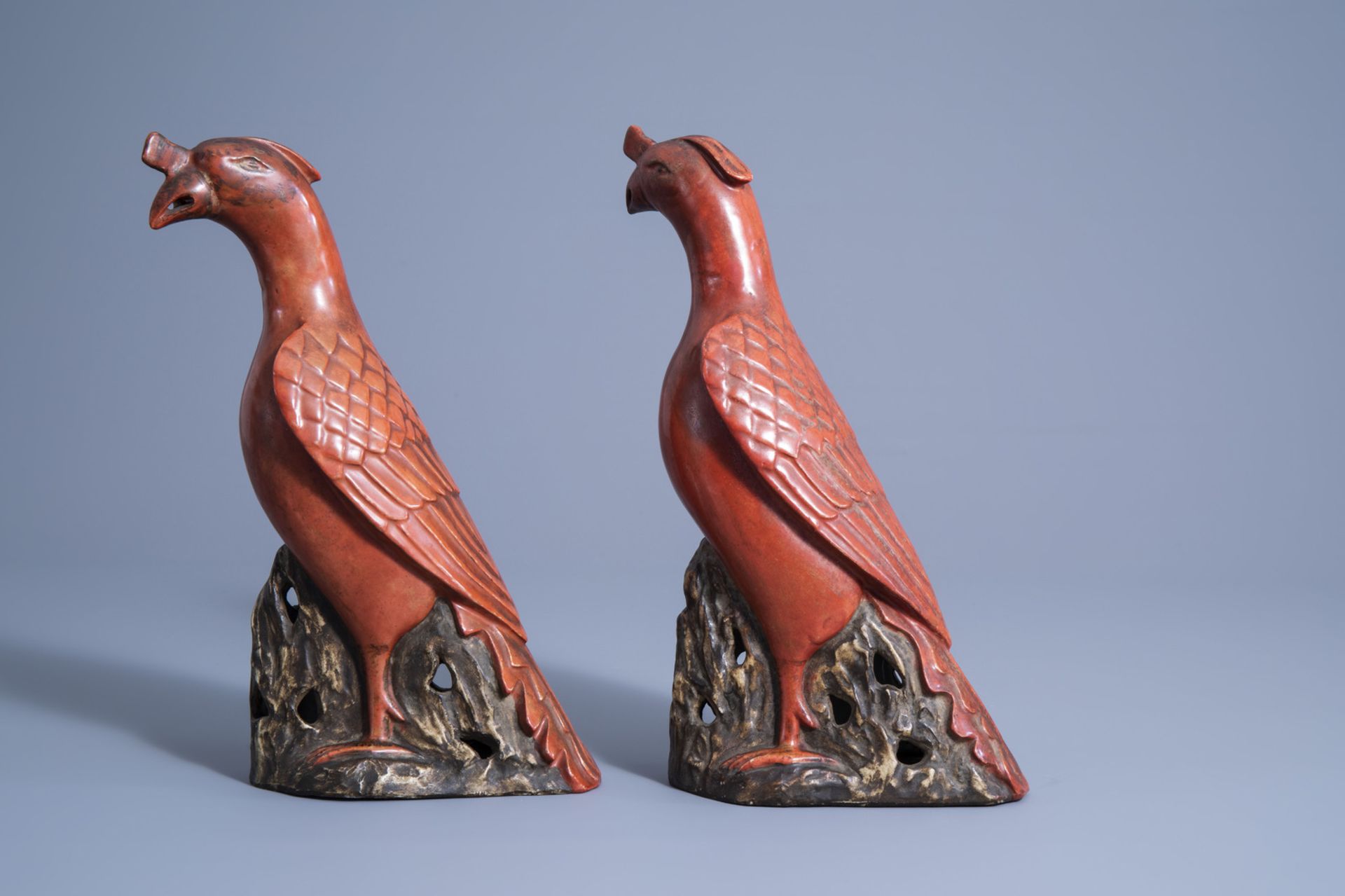 A pair of Chinese coral red and brown models of parrots, 20th C. - Image 4 of 7