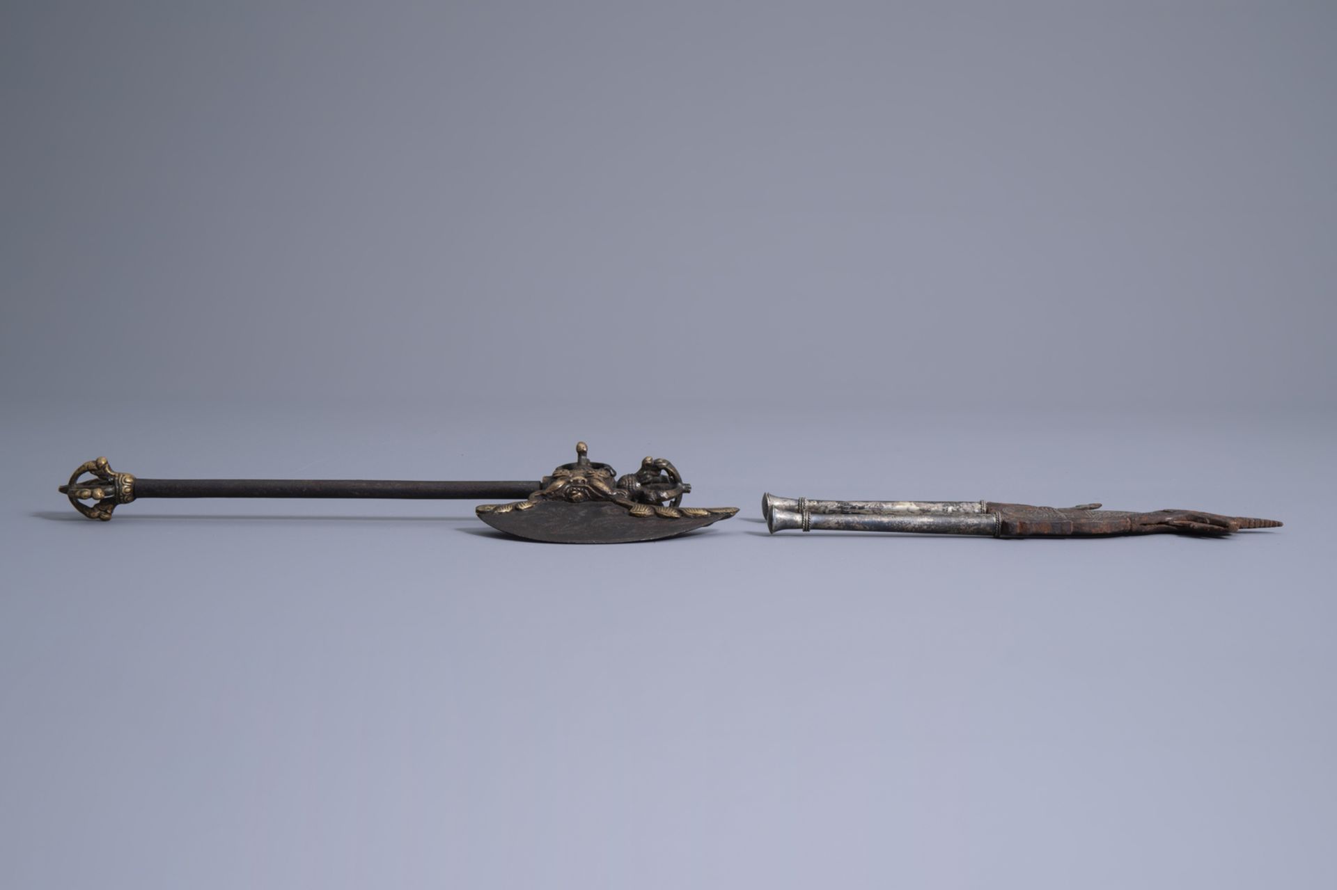 Three Tibetan miniature weapons, an Indonesian betel nut cracker and a kris, 19th/20th C. - Image 4 of 11