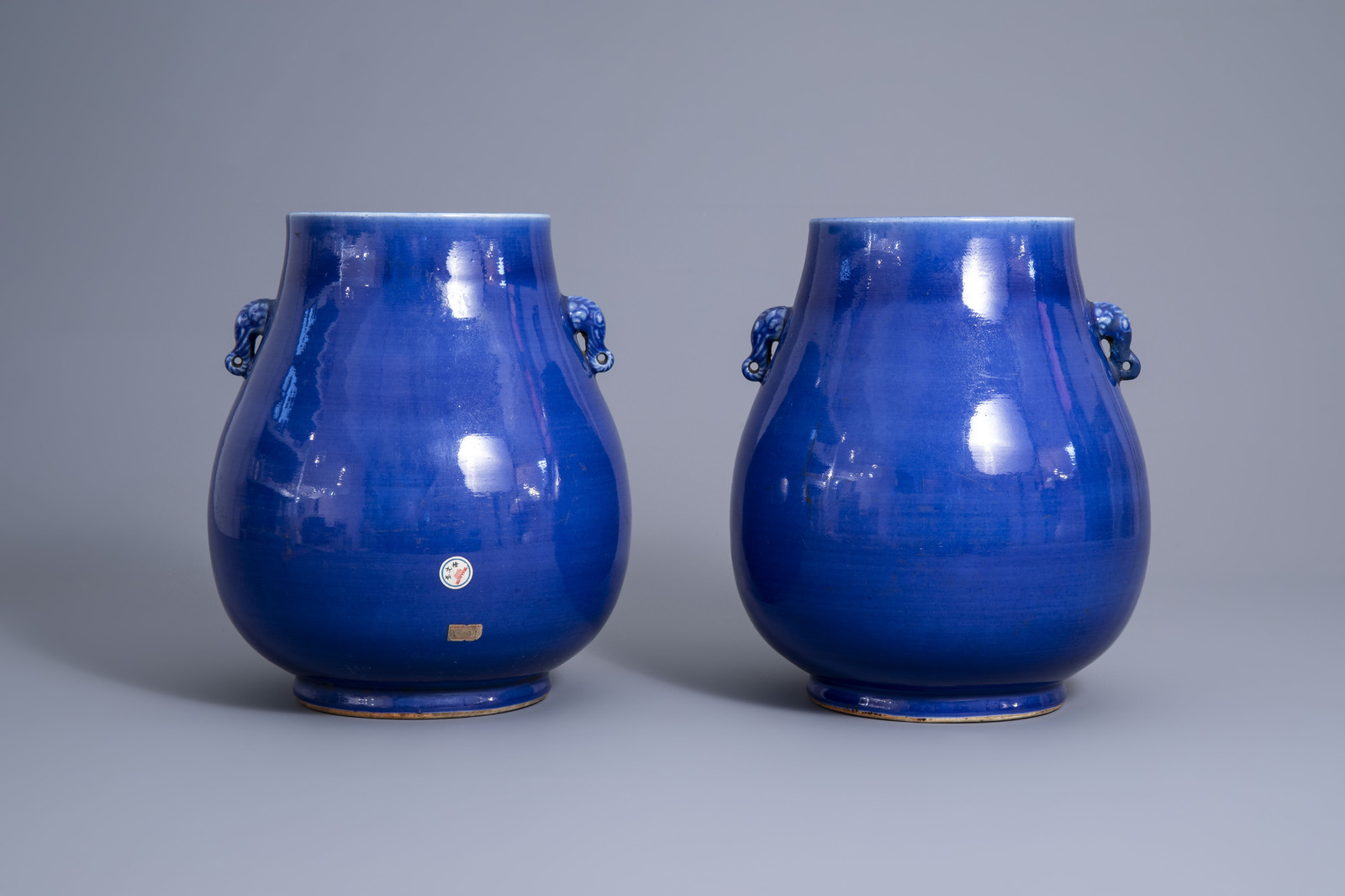 A pair of Chinese monochrome blue 'hu' vases, 19th C. - Image 2 of 8