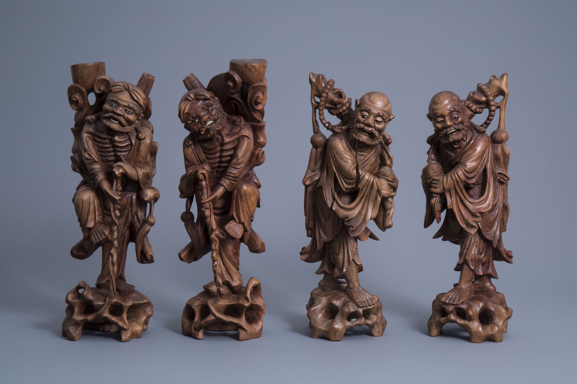 Four Chinese carved wooden figures of immortals, 19th/20th C. - Image 2 of 7