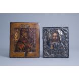 Two Russian icons, one with silver oklad or riza, 19th C.