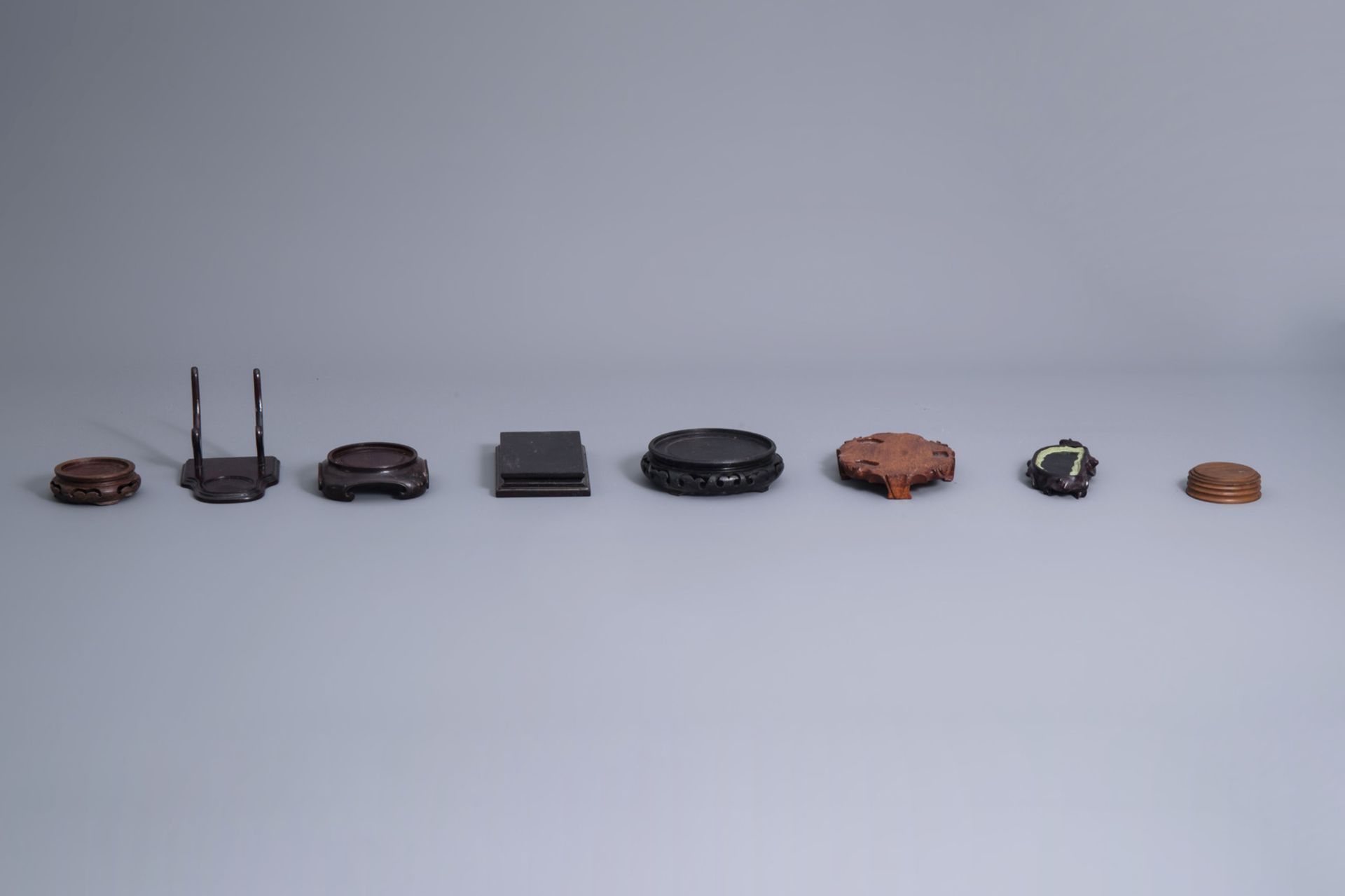 A collection of Chinese wooden stands, 19th/20th C. - Image 17 of 23
