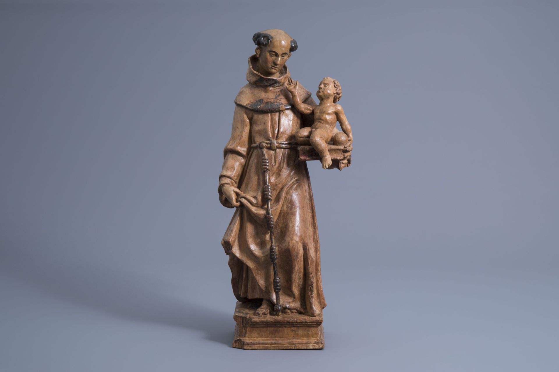 A carved wooden figure of Saint Anthony of Padua with Child, the Netherlands, 16th C. - Image 2 of 7