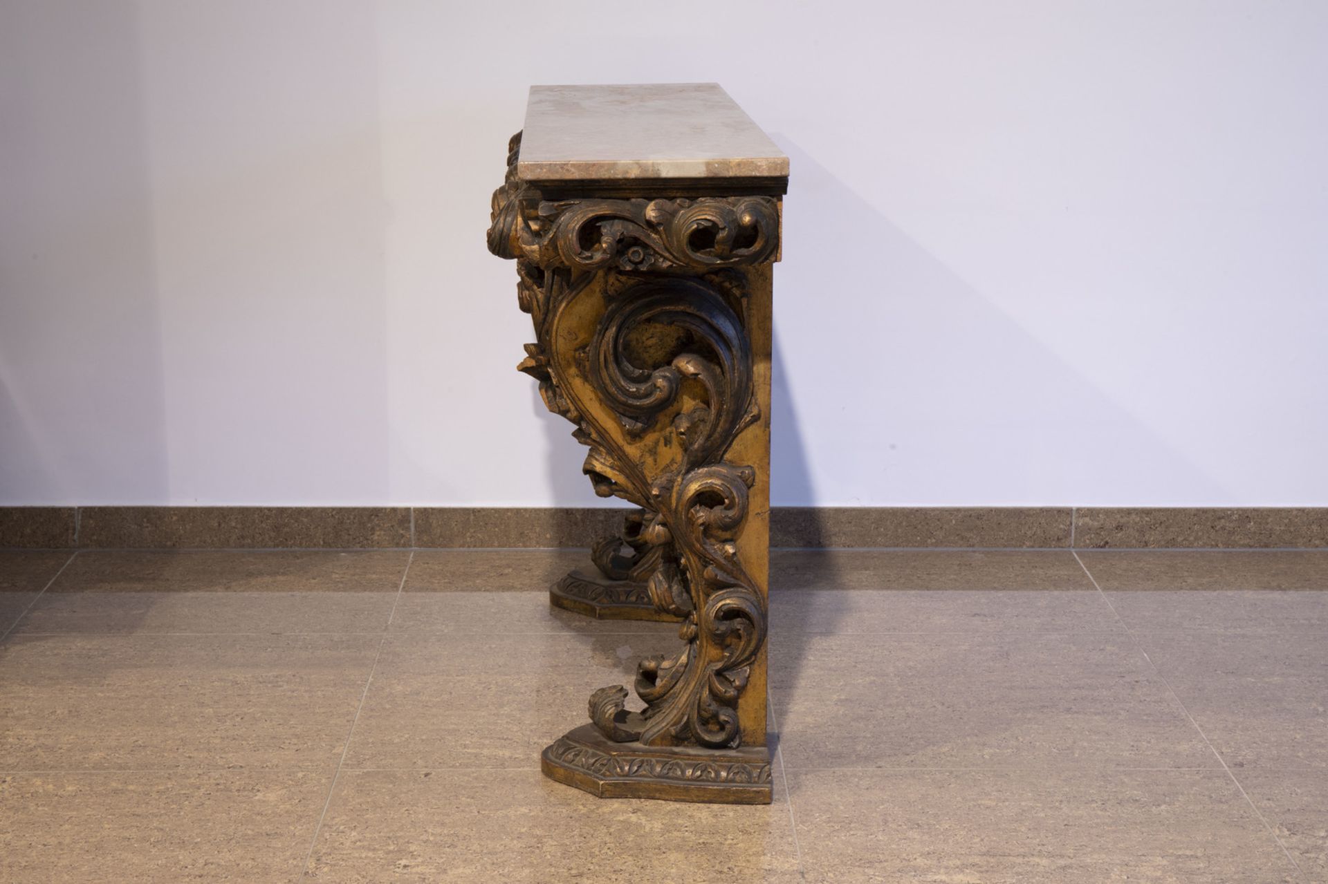 A Portuguese wooden wall console with marble top and matching Louis XV style mirror, 20th C. - Image 5 of 9